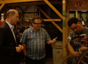 HRH The Prince Edward, Earl of Wessex visits Award participants volunteering at West Town Bikes in Chicago, IL.